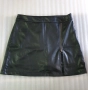 Къса пола от еко кожа с панталонки. Обиколка на талията 82см., снимка 1