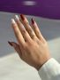 Красив дамски пръстен от медицинска стомана с блестящи камъни