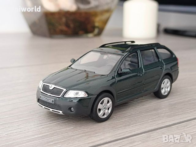 Skoda Octavia Combi Scout - мащаб 1:43 на Abrex моделът е нов в PVC дисплей-кейс, снимка 1 - Колекции - 46322006