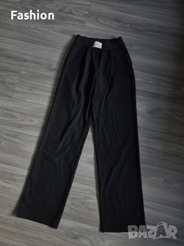 Жесток чер панталон DESIGNED