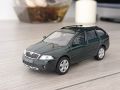 Skoda Octavia Combi Scout - мащаб 1:43 на Abrex моделът е нов в PVC дисплей-кейс, снимка 1