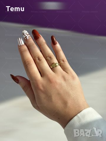 Златист дамски пръстен от медицинска стомана с изискана декорация звезда и блестящи камъни