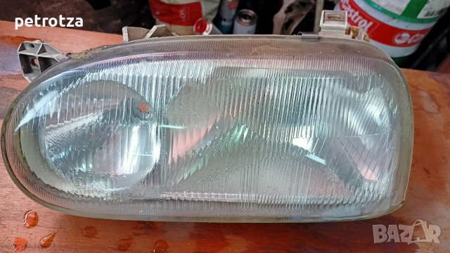 Фар за Голф 3, двусекционен, оригинален Hella