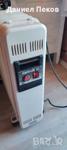 Електрически отоплителен радиатор , снимка 1 - Отоплителни печки - 45821029