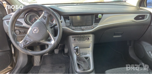 Opel Astra Sports Tourer, снимка 8 - Автомобили и джипове - 52752194