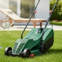 Електрическа косачка Bosch Rotak 32 - 1200W с GrassCombs, коси до самия ръб, кош 31 л, снимка 1