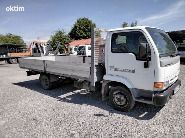 Продавам Nissan cabstar 2000 година с каросерия 4.70 м, снимка 2 - Бусове и автобуси - 43035712