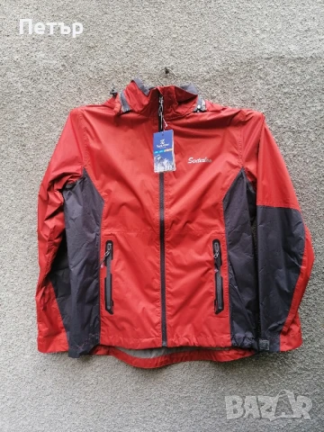 Продавам чисто ново дамско оранжево водоустойчиво яке Senterlan