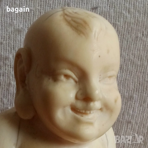 Буда от слонова кост.