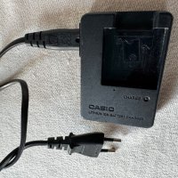 Оригинално зарядно за цифров фотоапарат CASIO BC-60L, снимка 1 - Батерии, зарядни - 45865709