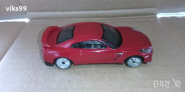 Bburago Nissan GT-R 2009 - Мащаб 1:43, снимка 6 - Колекции - 48236220