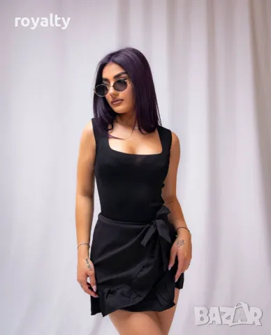 Елегантна черна дамска пола , снимка 2 - Поли - 49702833