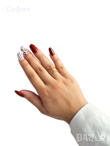 Дамски пръстен от медицинска стомана с нежни линии деликатна елегантност, снимка 1 - Пръстени - 45454456
