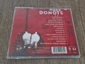 Компакт Дискове - Рок Метъл:  Donots - Wake the dogs, снимка 2