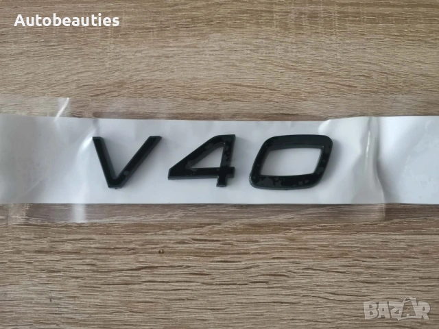 Volvo V40 черна емблема