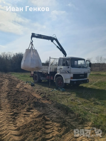 самосвал с кран ивеко 