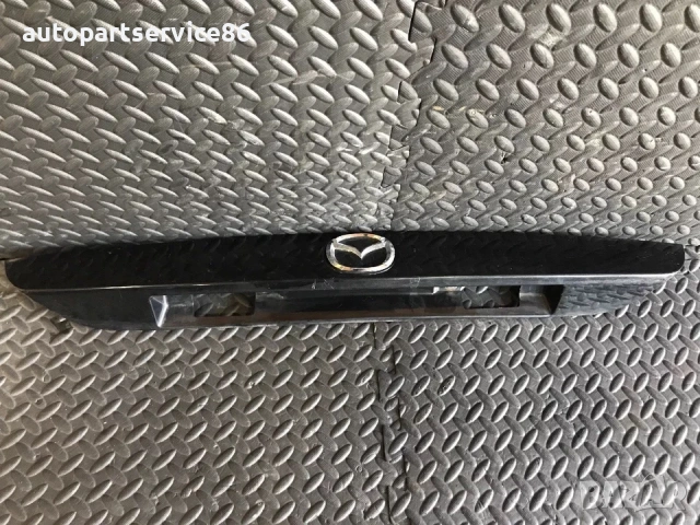Дръжка за отваряне на номерна табела за капака на багажника черен за Mazda 626 (2001) GG3E50810, снимка 3 - Части - 53704867