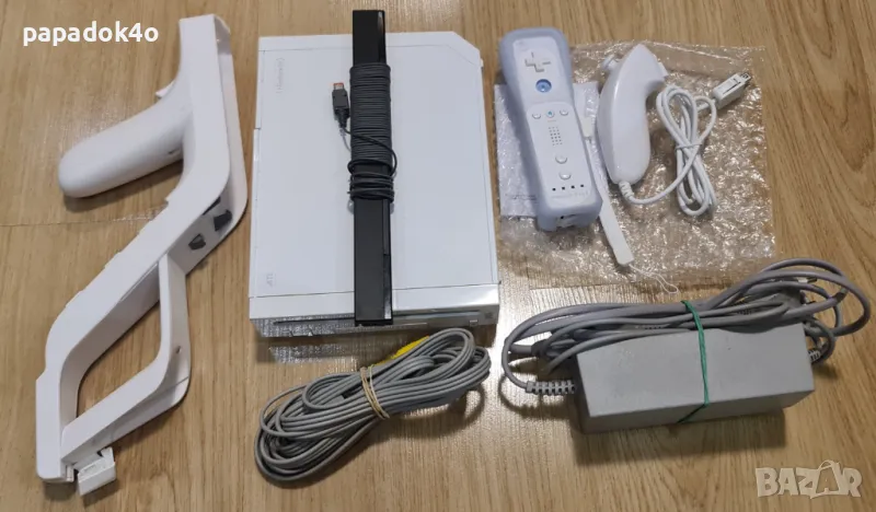 Пълен комплект конзола Nintendo Wii с 18 игри + пушка, снимка 1