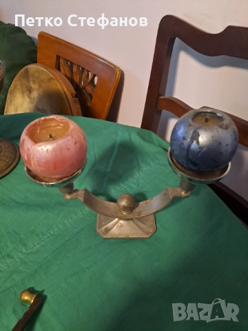 Античен метален свещник с две рамена.