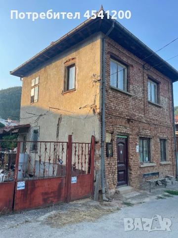 Къща с допълнителни парцели