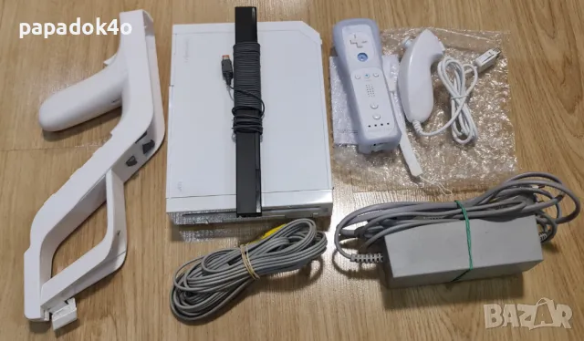 Пълен комплект конзола Nintendo Wii с 18 игри + пушка, снимка 1 - Nintendo конзоли - 48359491