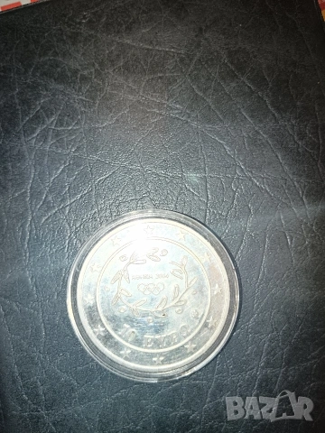 Продавам Юбилейна монета Олимпийски игри Гърция Конен спорт с тегло 34 грама сребро.