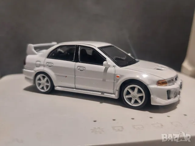 метална количка Mitsubishi lancer evolution v 1/64 , снимка 1 - Колекции - 46851157