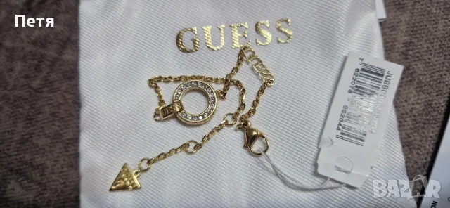 
GUESS - Регулируема гривна от неръждаема стомана, Златист, 21 CM, снимка 1 - Гривни - 48474710