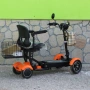 Инвалидна Електрческа Четириколка 350W (сваляема батерия) ОРАНЖЕВА, снимка 3