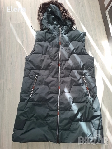 Дамски зимен елек в зелен цвят. 