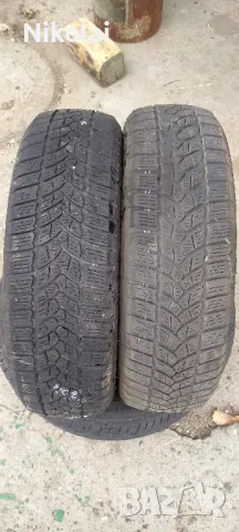 2бр зимни гуми 175/65R15 Firestone, снимка 1 - Гуми и джанти - 47283719