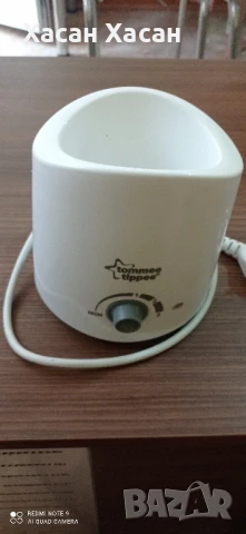 уред за стопляне на бебешко мляко.