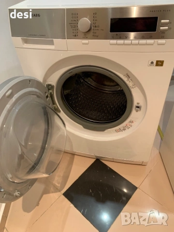 За части пералня със сушилня AEG