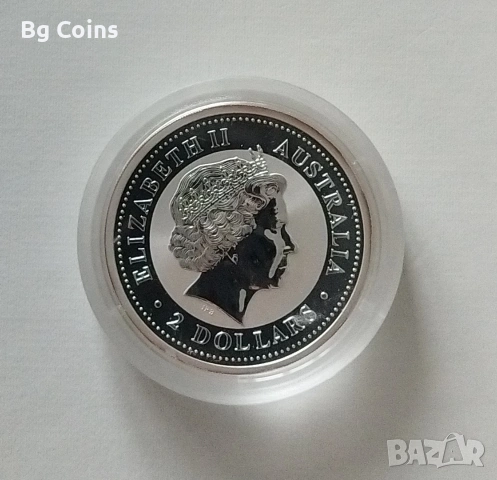 Сребро 2 OZ 2006 Куче, снимка 2 - Нумизматика и бонистика - 53446839