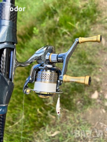 Shimano Stella C2000S, снимка 2 - Макари - 46645792