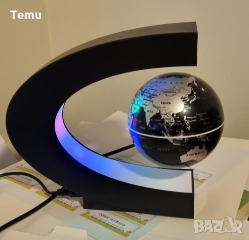 Левитиращ глобус, LED осветление/ Красив и иновативен дизайн. Магнитна С-образна поставка, с красиви, снимка 1 - Настолни лампи - 45795576