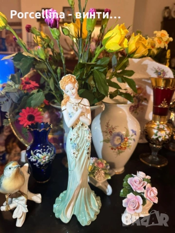 Coalport England  грациозна фигура от серията Spirits of Jewels - "Emerald" 