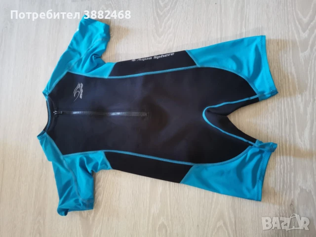 Неопренов костюм Aqua Sphere 12 години по етикет според мен е за 7/8  години 