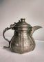 Арабски чайник с богата орнаментика ,тежък и масивен . 