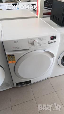 Сушилня AEG 7000 клас А+++ инверторен мотор, термопомпа 8кг. 