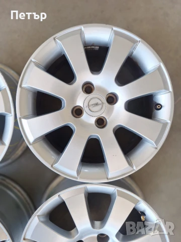 ОРИГИНАЛНИ АЛУМИНИЕВИ ДЖАНТИ ЗА OПЕЛ-4Х100Х56.6-15 цола, снимка 4 - Гуми и джанти - 50683476