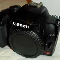 Фотоапарат DSLR Canon EOS 1000D / EF-S 18-55 IS . 50мм /1.8 . EF-S 35-80mm /​, снимка 2 - Фотоапарати - 45276659