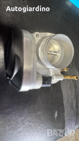 Дроселова клапа STARK SKTB-0430063 / 4059191173761 за Audi, SEAT, Skoda и Volkswagen.