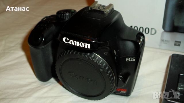 Фотоапарат DSLR Canon EOS 1000D / EF-S 18-55 IS . 50мм /1.8 . EF-S 35-80mm /​, снимка 2 - Фотоапарати - 45276659