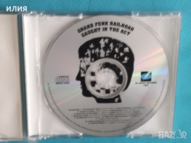 Grand Funk Railroad – 1975 - Caught In The Act(Hard Rock), снимка 3 - CD дискове - 45505210