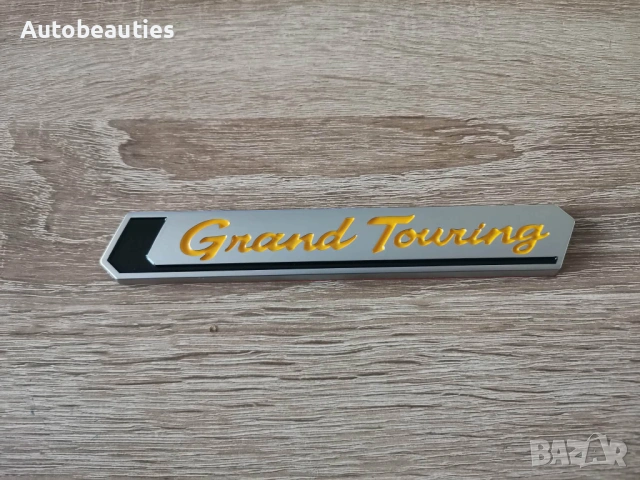 Емблема Toyota Grand Touring