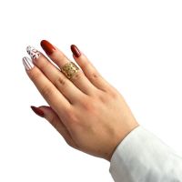 Голям дамски пръстен от медицинска стомана със завладяващ дизайн с дупки и златисто покритие, снимка 1 - Пръстени - 45454408