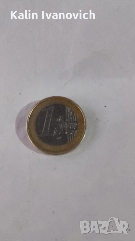 евро монета