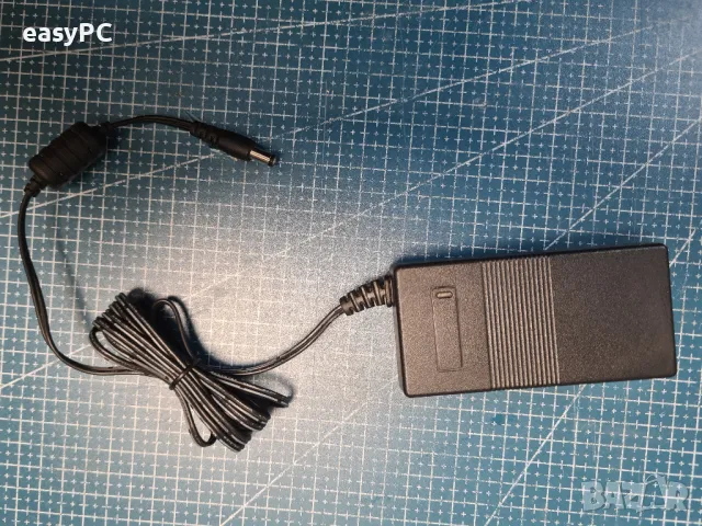 Оригинален захранващ адаптер SAGEMCOM  12V 2.0A , снимка 4 - Друга електроника - 49298897