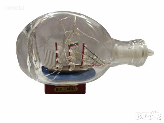 Сувенир Кораб в бутилка,  Светещ, Стъклен, 13х8 см, снимка 1 - Морски сувенири - 46294452